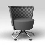 The Circo swivel chair by Cor; 
strapped back ver...