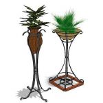 Wrought iron vase stand plants by others are not i...