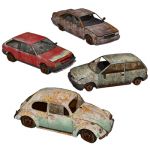 This is a set of very damaged and abandoned cars, ...