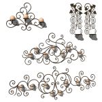 4 different wrought iron wall hung candle holders.