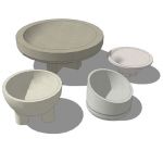 Assortment of circular concrete planters from Waus...