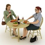 Two formal adult women dining.