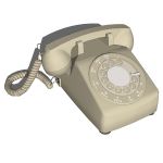 Traditional dial ring telephone.